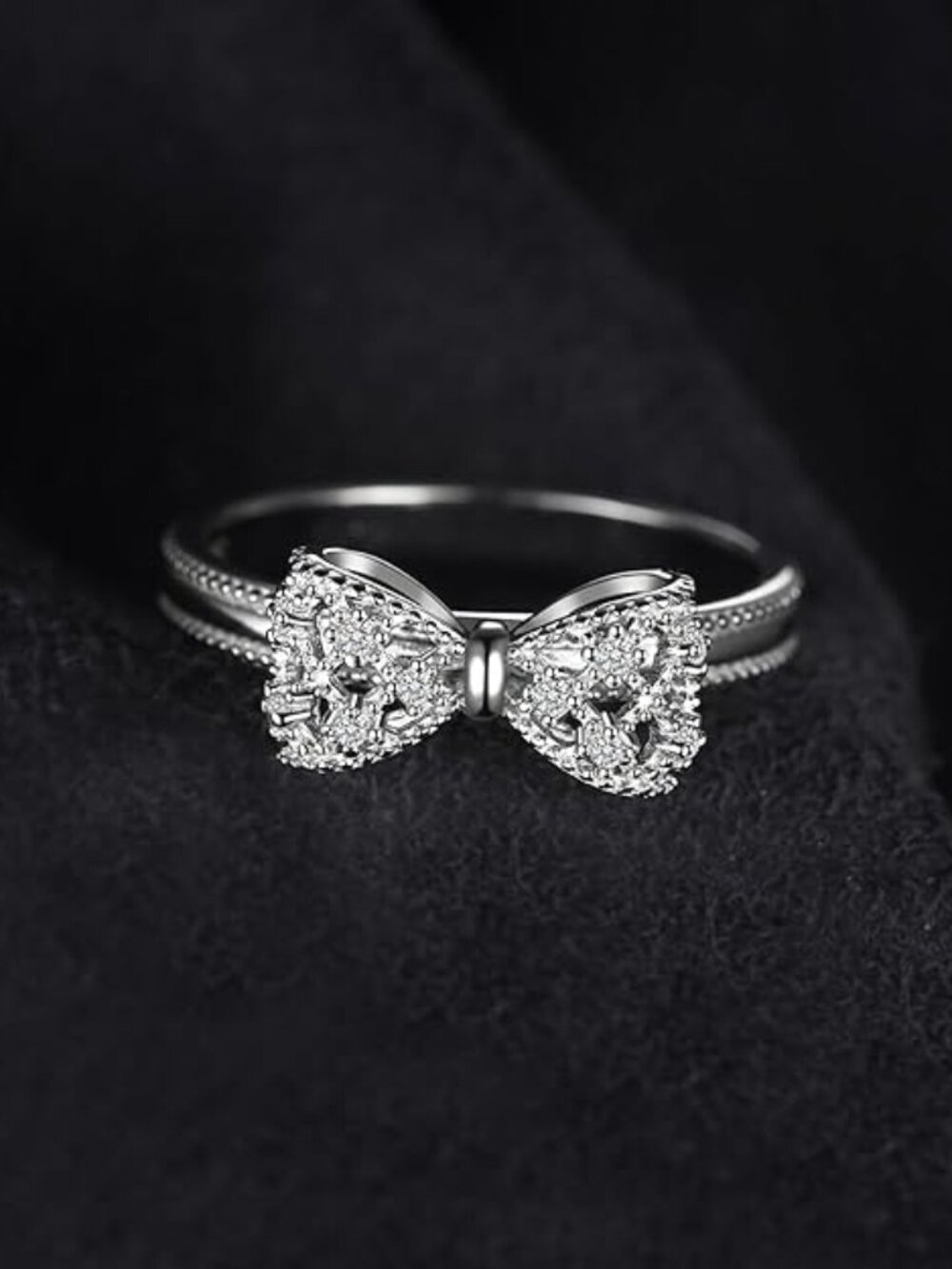 .925 Sterling Silver with White Diamond Cubic Zirconia Infinity Forever Bow Ring - Picture 2 of 10